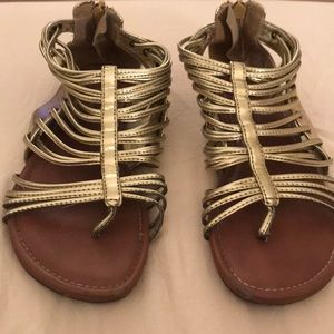 Gold size 4 xhilaration girls’ sandals.